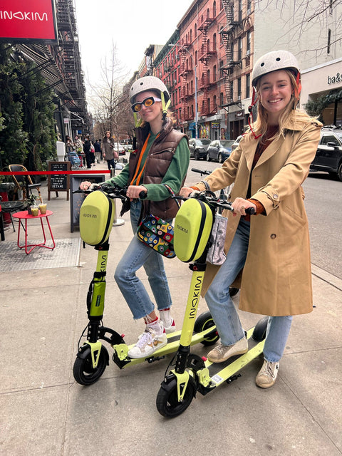 the Twins on a scooter in nyc 